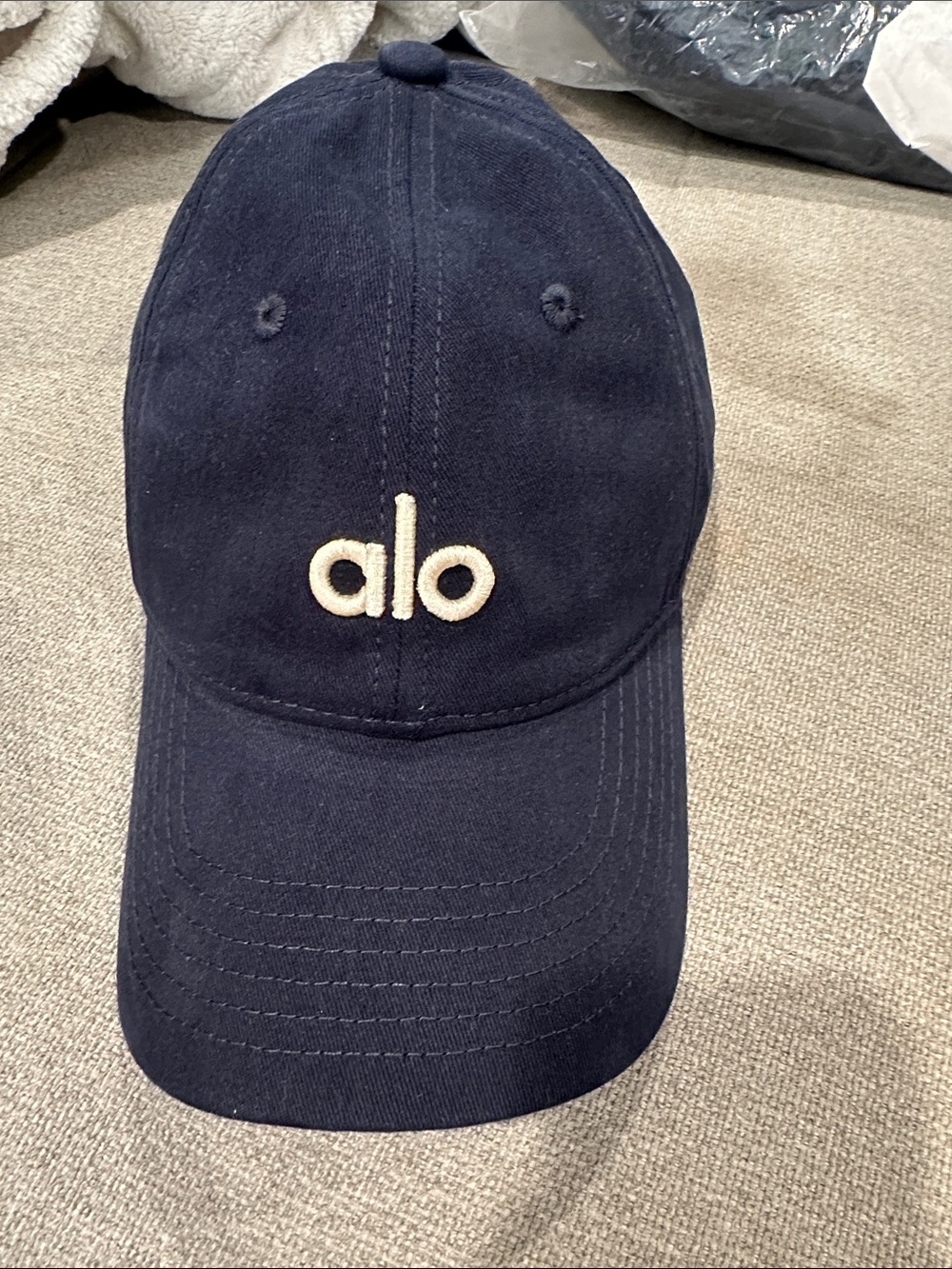 Navy Cap with Cream Logo